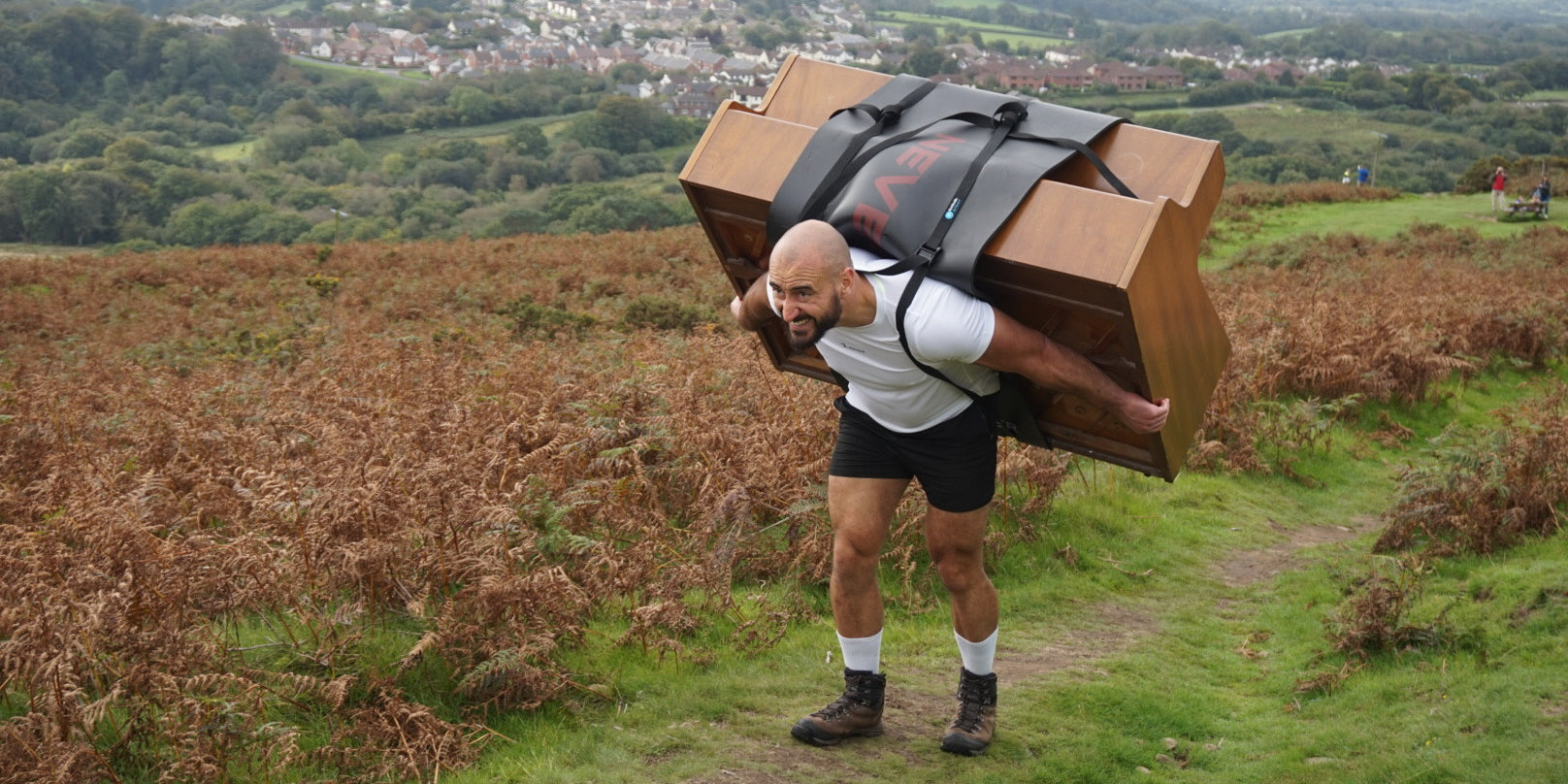 Max Glover Carries Piano up Mountain for Charity